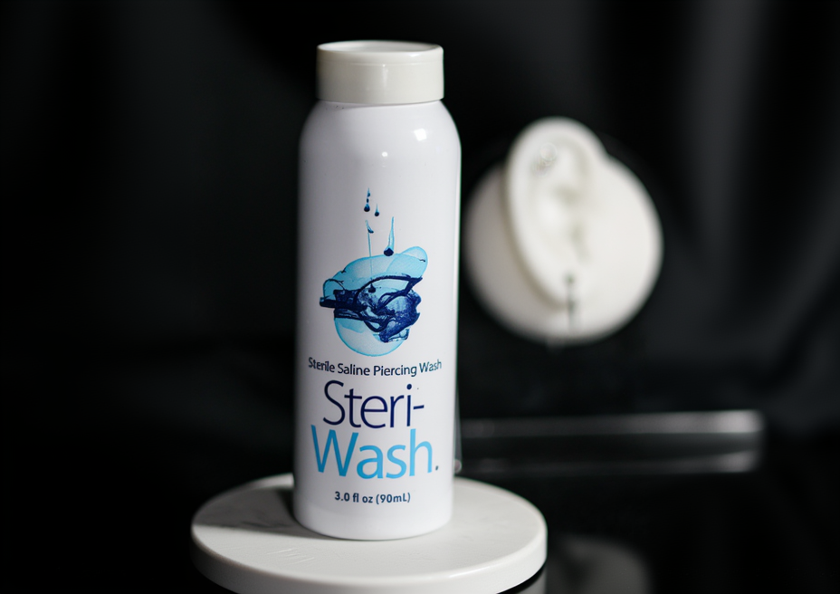 Steri-Wash Saline Solution in a white 3.0 fl oz (90ml) bottle is visible