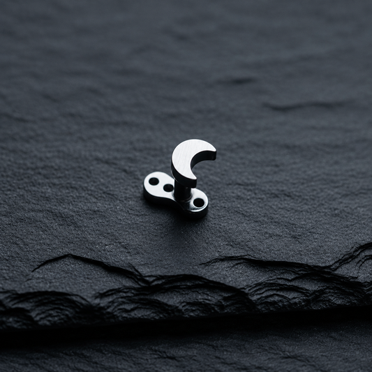 Crescent Moon Dermal Top on black rock