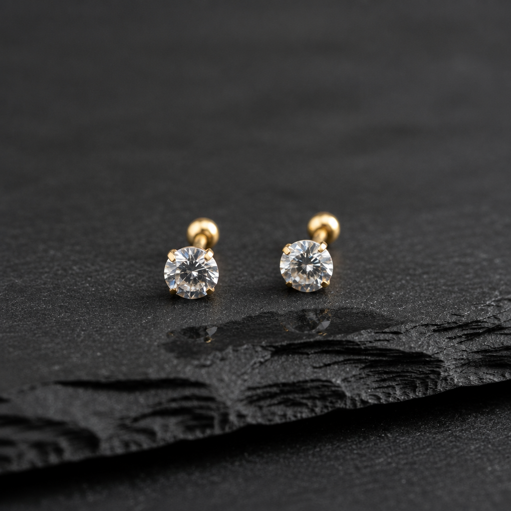 Classic PVD Gem Stud Pairs on black rock